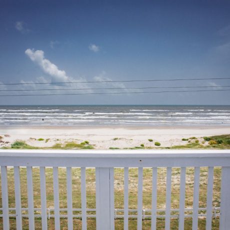 view of the beach and sea from a cottage at Blue Water RV Resort