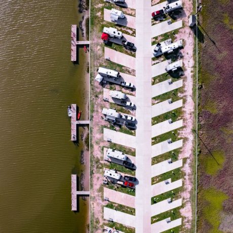 Stunning aerial view of the RV sites and canal at Blue Water RV Resort